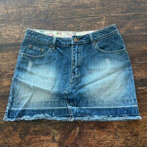 Mini blue denim skirt with inside floral lining